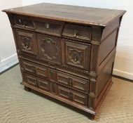 A 17th Century oak and walnut chest,