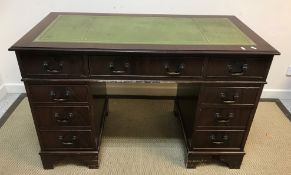 A modern mahogany kneehole desk in the Georgian style,