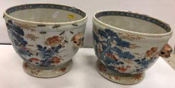 A pair of 19th Century Chinese Imari bowls or ice pails under glazed in blue over glazed in oxide