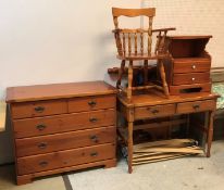 A pine bedroom suite comprising chest of two short over three long drawers,