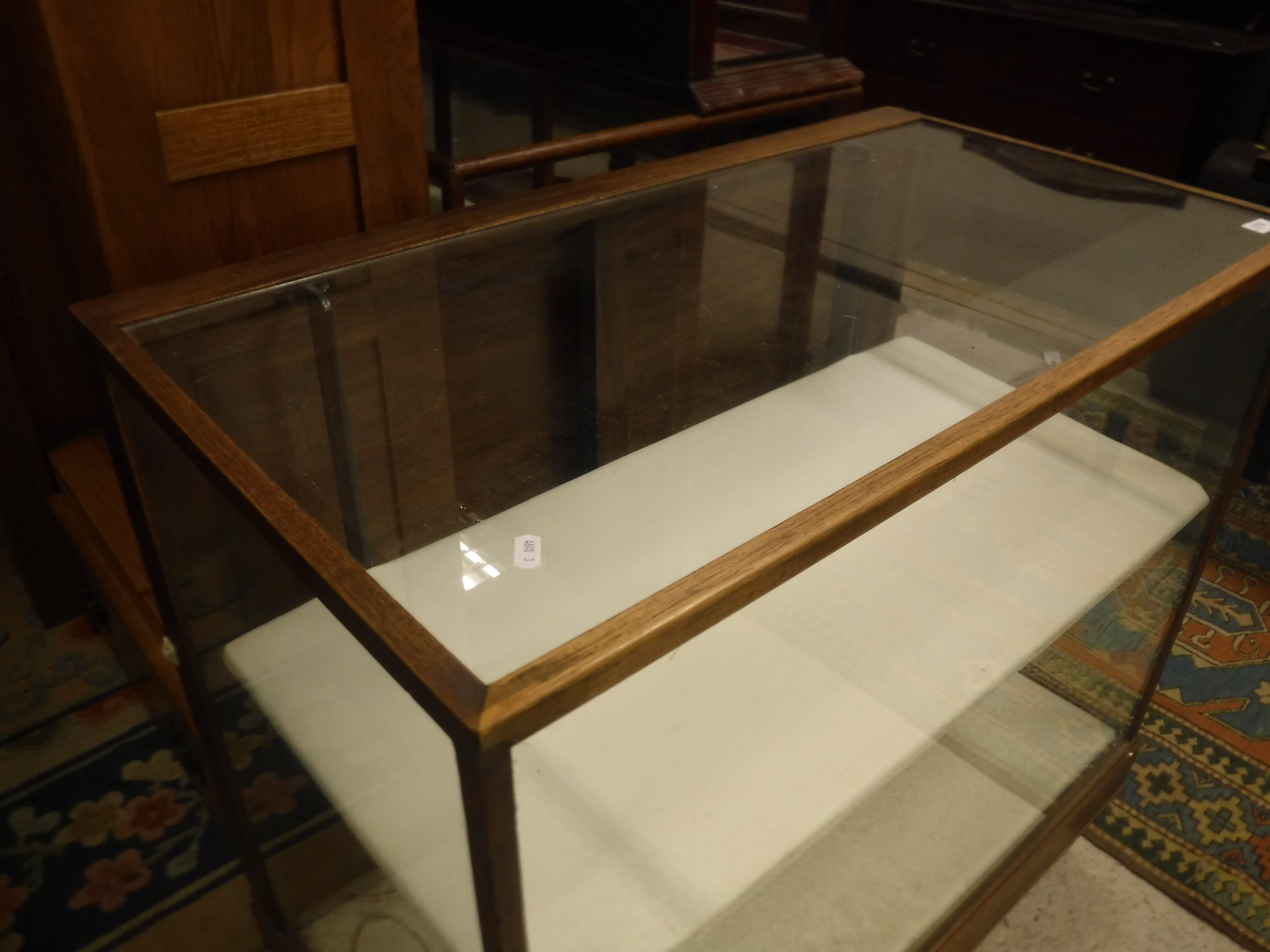 An early 20th Century mahogany framed shop display counter with glazed panels and sliding door to - Image 6 of 11