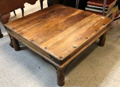 An Indonesian hardwood square coffee table,