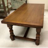 An oak draw leaf dining table in the 17th Century manner,