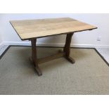 An oak refectory style kitchen table,