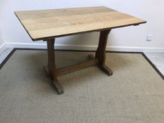 An oak refectory style kitchen table,