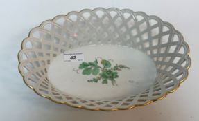 A 20th Century Berlin KPM porcelain chestnut basket with pierced oval main body the centrefield