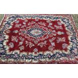 A Kirman carpet,