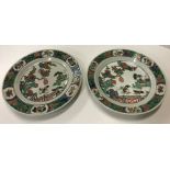 A matched pair of Chinese Kangxi famille verte plates,