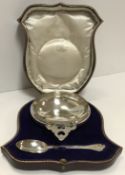 A George IV silver christening bowl and spoon, the bowl in the form of an oversized tas de vin,