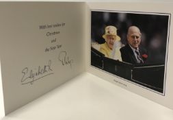 A Royal Christmas card signed "Elizabeth R and Prince Philip",