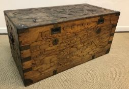 A carved camphor wood chest with exotic bird, phoenix and dragon decoration,