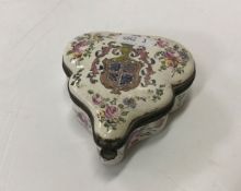 An 18th Century Lille pottery box and cover of leaf shape with all-over floral spray decoration,