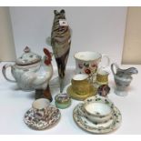 A collection of various china wares to include a Newhall style wrythen moulded teapot with floral