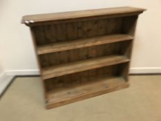 A Victorian painted pine two door cupboard, the two four panelled doors enclosing two shelves, 152.