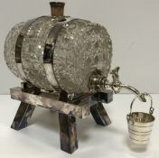 A cut glass and silver plated brandy barrel by John Grinsell & Son circa 1870 with a bucket shaped