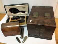 An early 20th Century Chinese rosewood and brass mounted dressing table box,