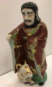 A 19th Century Japanese porcelain polychrome decorated figure as a curly haired gentleman with