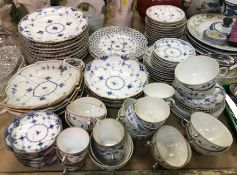 A collection of Royal Copenhagen blue and white china to include four leaf shaped dishes,