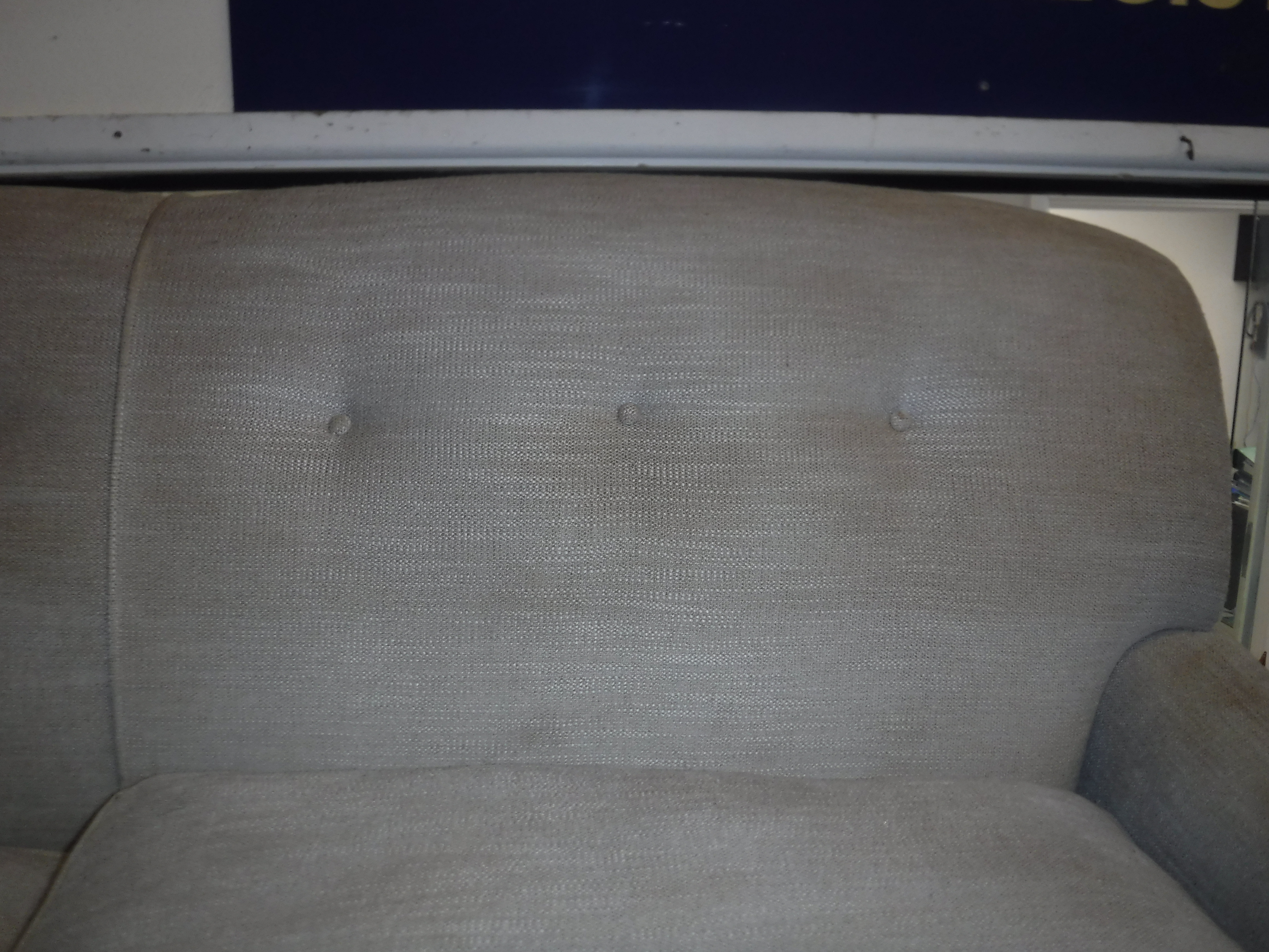 A modern mushroom or taupe upholstered two seat sofa in the Howard manner, - Image 5 of 10