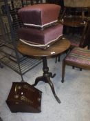 A wooden coal scuttle, a mahogany circular occasional table on tripod base,