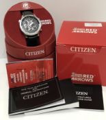 A Citizen Eco Drive Red Arrows Chronograph watch with instruction booklet,