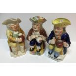 A collection of three 19th Century Toby jugs as "Toby Philpott seated with jug of ale upon his left