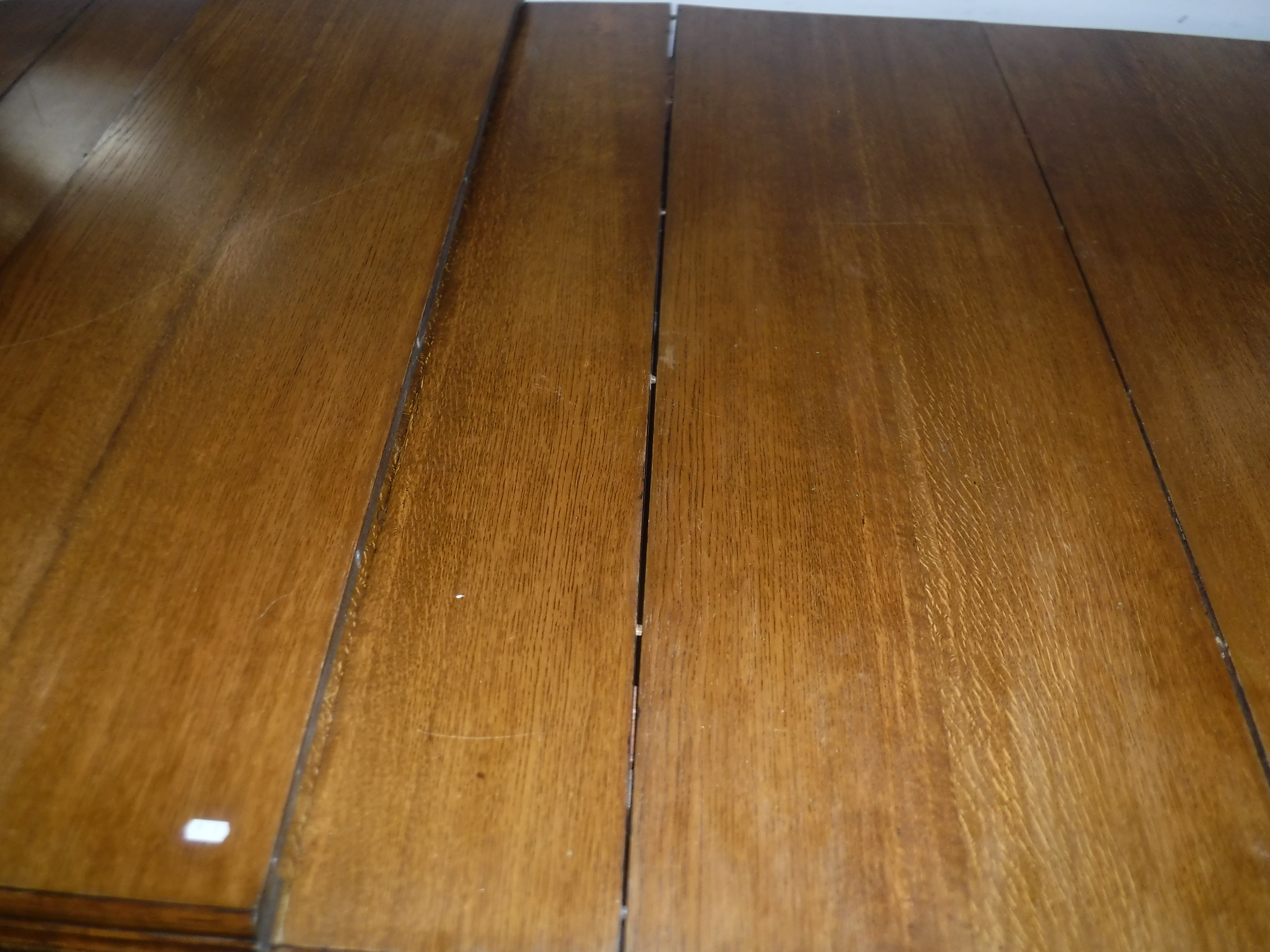 A Victorian oak shallow D end extending dining table with three extra leaves and moulded edge, - Image 5 of 20