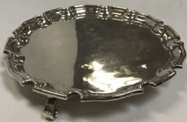 A 20th Century silver card tray with pie-crust edge,