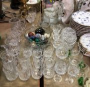 A collection of various cut glassware to include two Tyrone pineapple cut glass mugs,