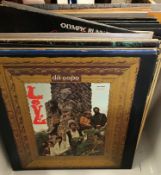 A box containing a collection of LPs including LOVE "Da Capo", BEE GEES "First",