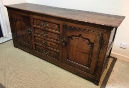 An 18th Century oak enclosed dresser,