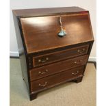 An Edwardian mahogany and satinwood banded bureau,