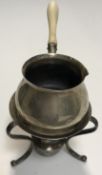 A Victorian silver brandy warmer with ivory handle, raised on three bun feet,