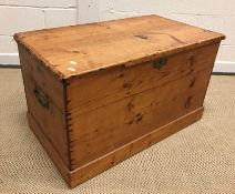 A pitch pine tack box with brass carrying handles, 87.5 cm wide x 48 cm deep x 50.