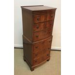 A Bevan Funnel Limited "Reprodux" mahogany bow fronted chest on chest of six drawers,