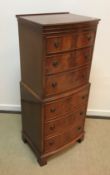 A Bevan Funnel Limited "Reprodux" mahogany bow fronted chest on chest of six drawers,