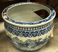 A 19th Century Chinese blue and white jardinier of large proportions,