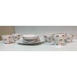 A Shelley "Charm" floral spray decorated pink ground part tea set comprising cream jug, four cups,