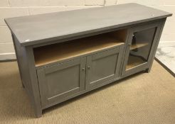 A modern painted dwarf side cabinet,