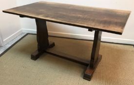 An early 20th Century oak refectory style table, 135 cm long x 82 cm wide x 76 cm high,