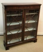 A late 19th Century mahogany bookcase cabinet,