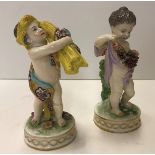 A pair of 19th Century Continental figures emblematic of The Seasons, one with wheatsheaf,