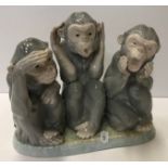 A Lladro figure group of three monkeys "Monkey Business", "See no evil, Hear no evil,