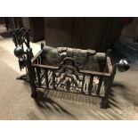 A wrought iron fire basket in the Arts & Crafts manner, 66.5 cm wide x 34 cm deep x 42.