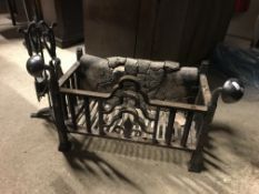 A wrought iron fire basket in the Arts & Crafts manner, 66.5 cm wide x 34 cm deep x 42.