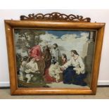 A Victorian maple veneered framed needlework tapestry of "Christ blessing children" (with old