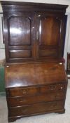 An 18th Century oak bureau bookcase,