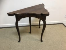 An early 20th Century African hardwood veneered card table in the Georgian style,