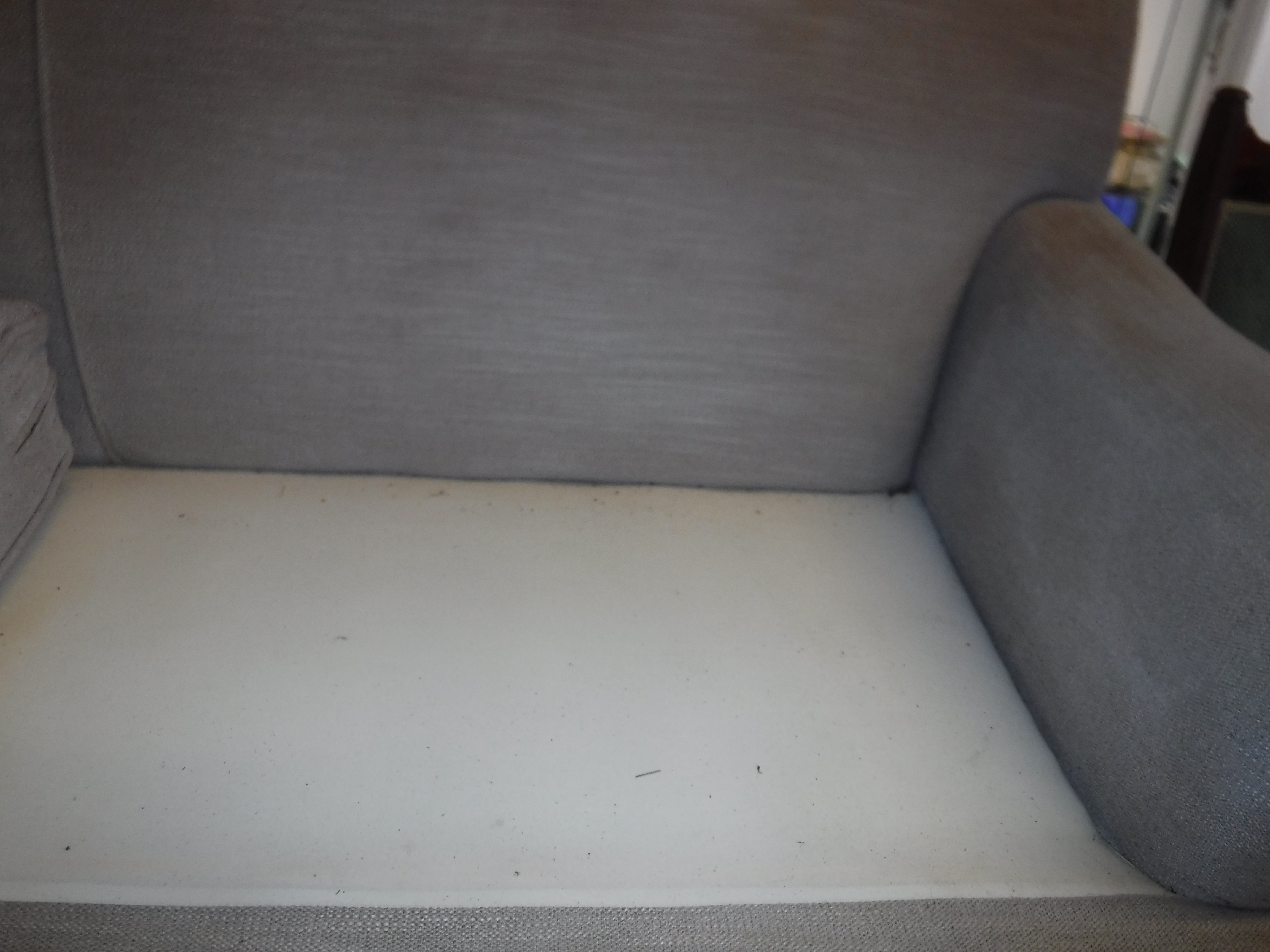 A modern mushroom or taupe upholstered two seat sofa in the Howard manner, - Image 4 of 10