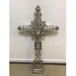 A plated cast metal ecclesiastical cross, the centre depicting the Madonna (or poss. St.